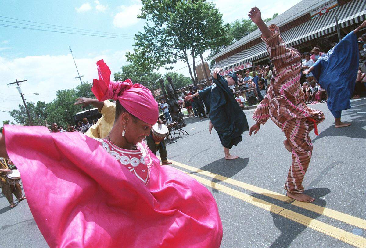 Erika Bethea, a dancer for the Kambankafo Dancing Drum Ensemble of Greensboro, moves to the rhythm during a celebration of Juneteenth Day on Saturday, June 19, 1999. 
