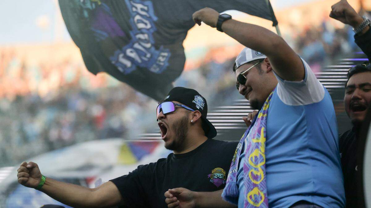 Fans celebrate Charlotte FC’s goal during the match against Inter Miami at Bank of America Stadium on Saturday, October 21, 2023 in Charlotte, NC. Charlotte FC held onto their lead to defeat Inter Miami, 1-0, clinching a spot in the playoffs.