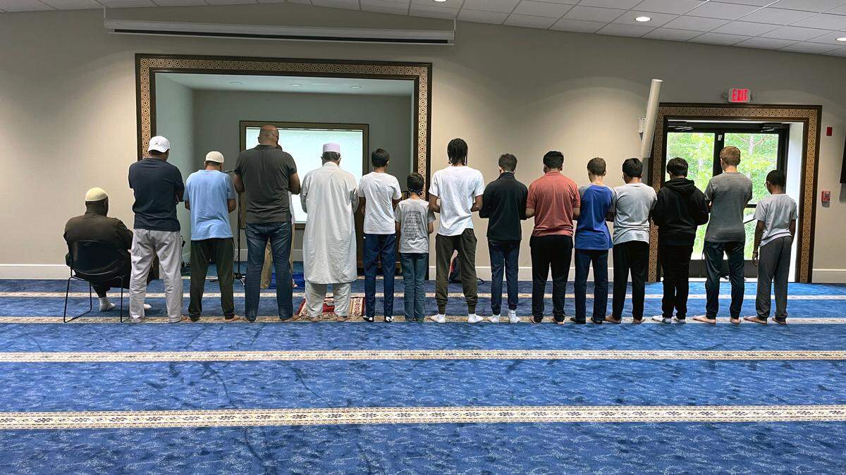 Prayer before a summer youth camp at the Muslim Community Center in Charlotte.