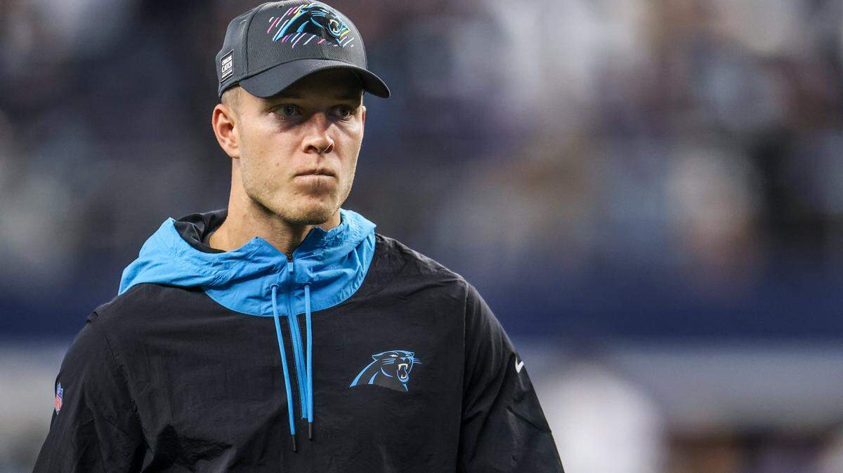 Carolina Panthers running back Christian McCaffrey leaves the field after a loss to the Dallas Cowboys on Sunday.