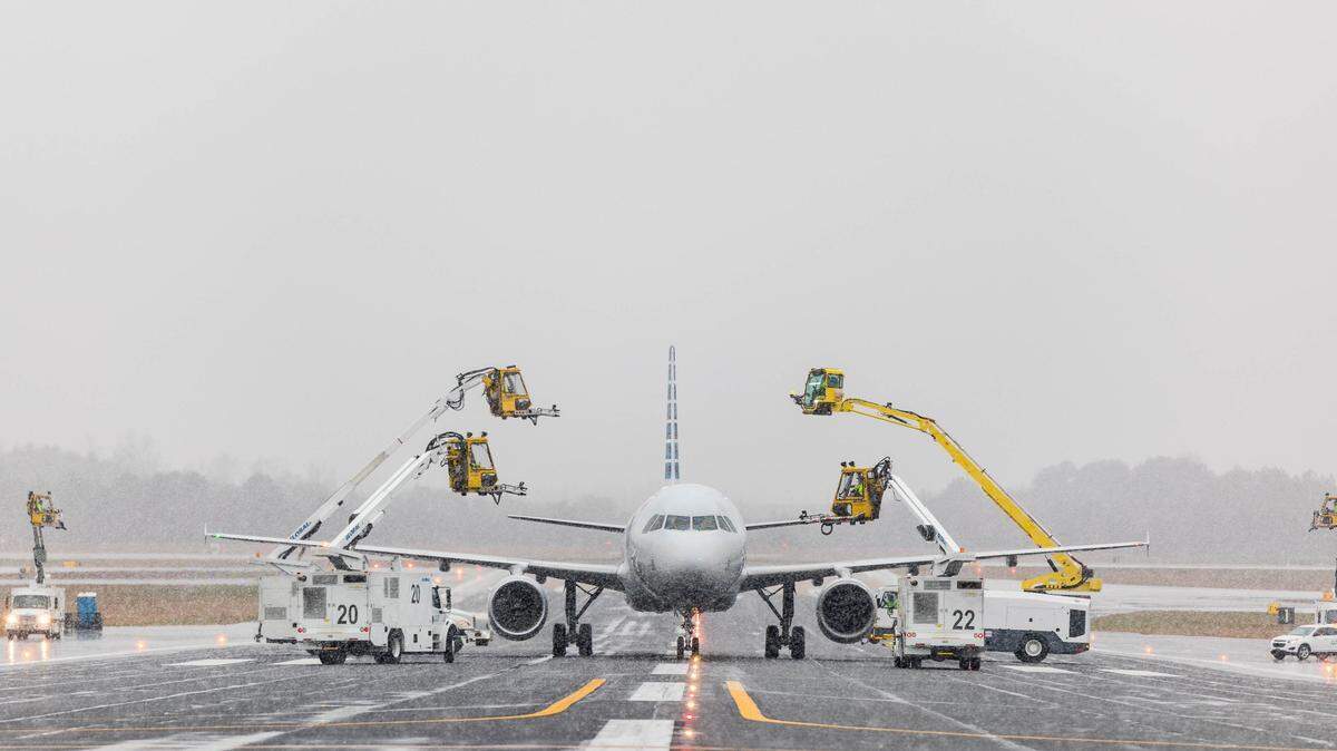 American Airlines works with a vendor to de-ice planes to prepare for winter weather.
