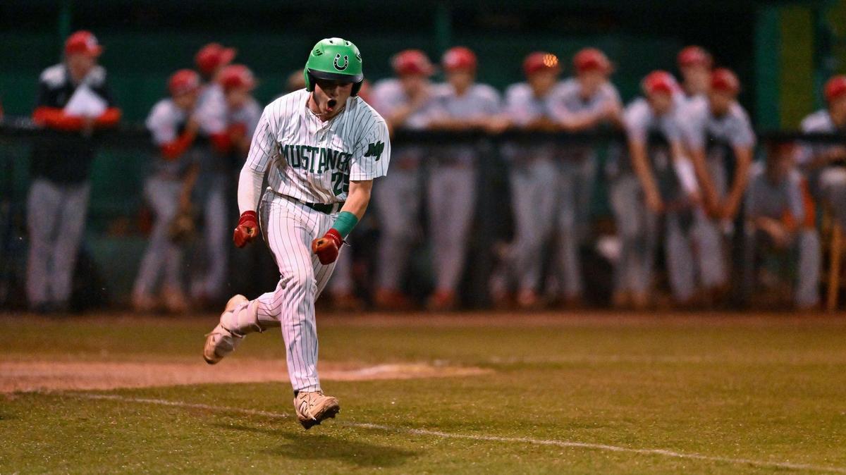Myers Park’s Jaxon West (25) reeacts after hitting a RBI single duing a varsity baseball game against South Mecklenburg, Tuesday, April 22, 2025, in Charlotte, N.C. (Charlotte Observer/Matt Kelley)