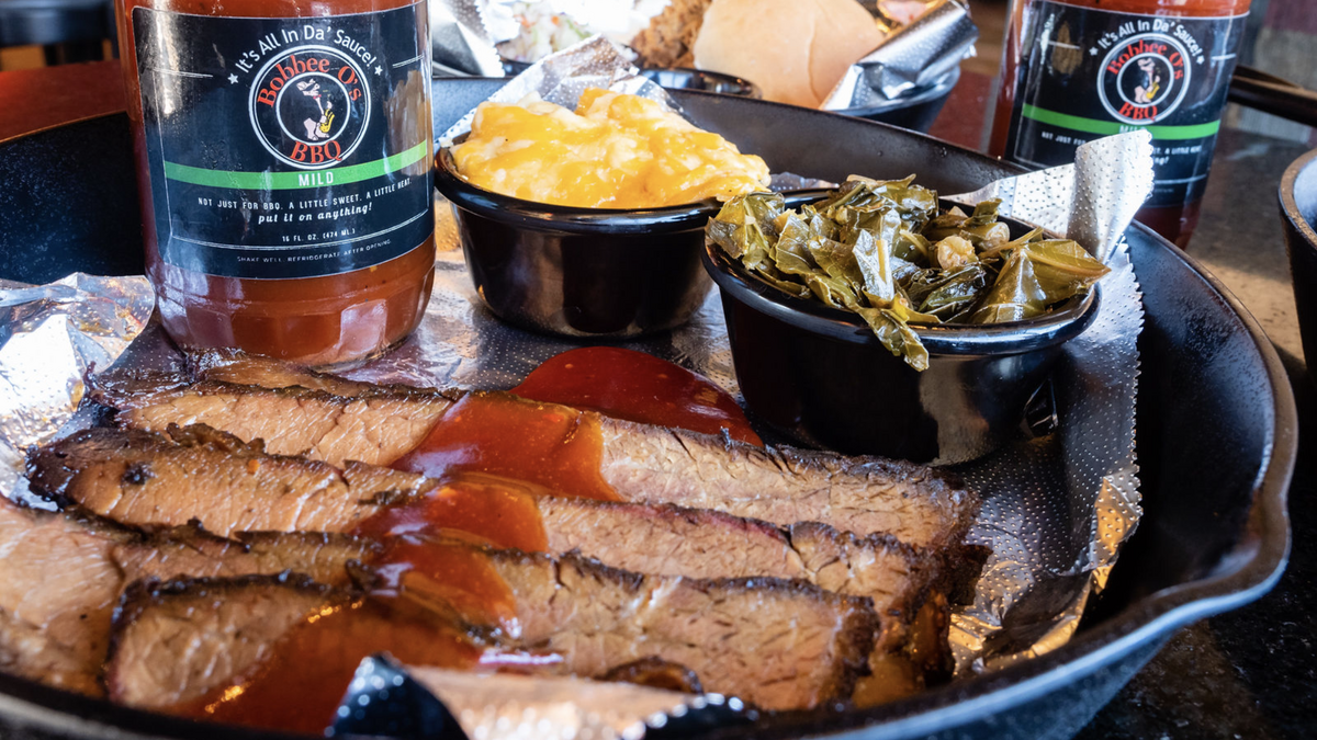 Bobbee O’s BBQ has dinner platters where guests get their choice of two sides and one bread item.