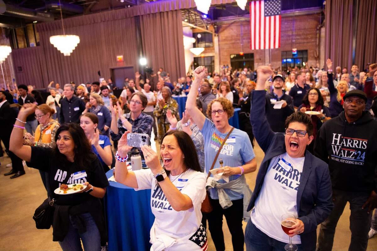 Attendees react to early voting results during election night at The Revelry in Charlotte, NC on November 5, 2024.