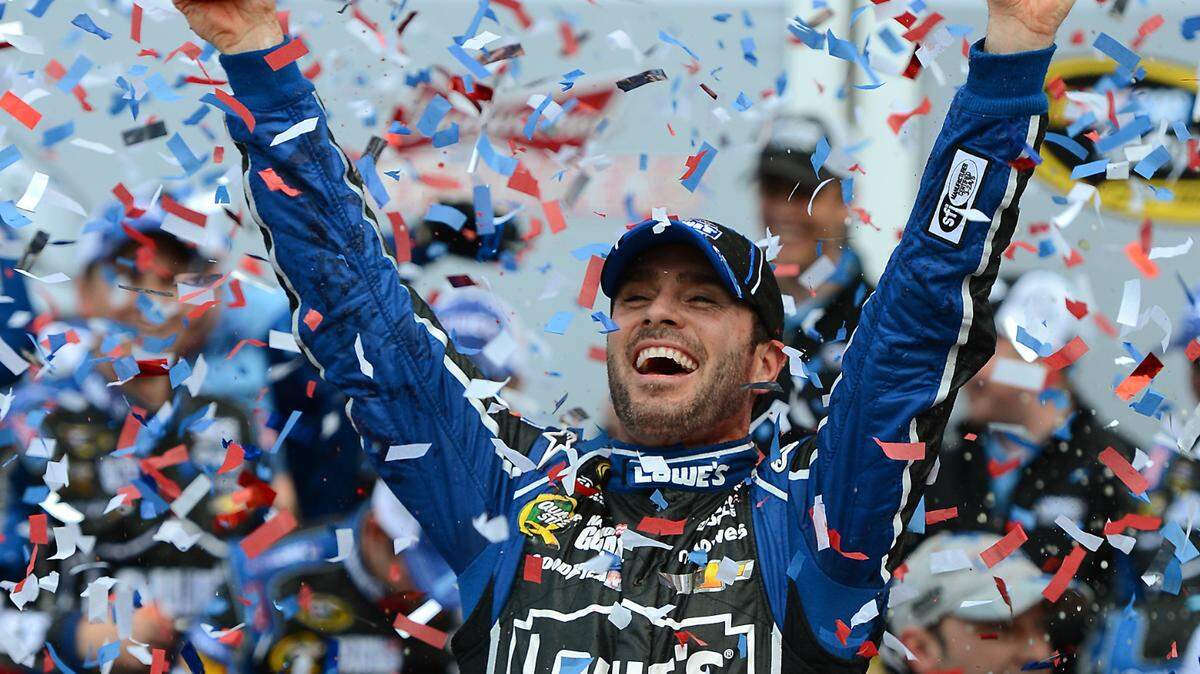 NASCAR Sprint Cup Series driver Jimmie Johnson celebrates his victory in the Daytona 500 at Daytona International Speedway on Sunday, February 24, 2013.