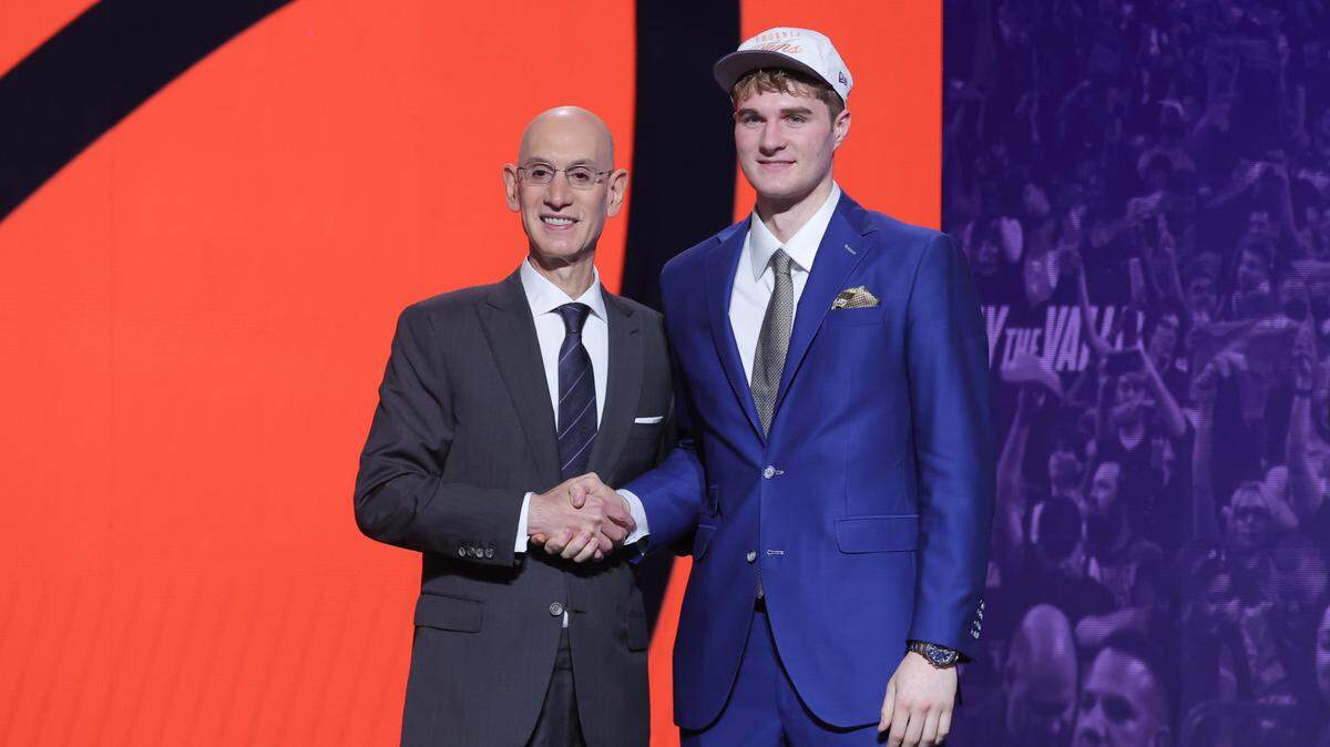 UConn’s Liam McNeeley stands with NBA commissioner Adam Silver after being selected as the 29th pick by the Phoenix Suns in the first round of the 2025 NBA Draft at Barclays Center. The Hornets acquired McNeeley in a trade with the Suns.