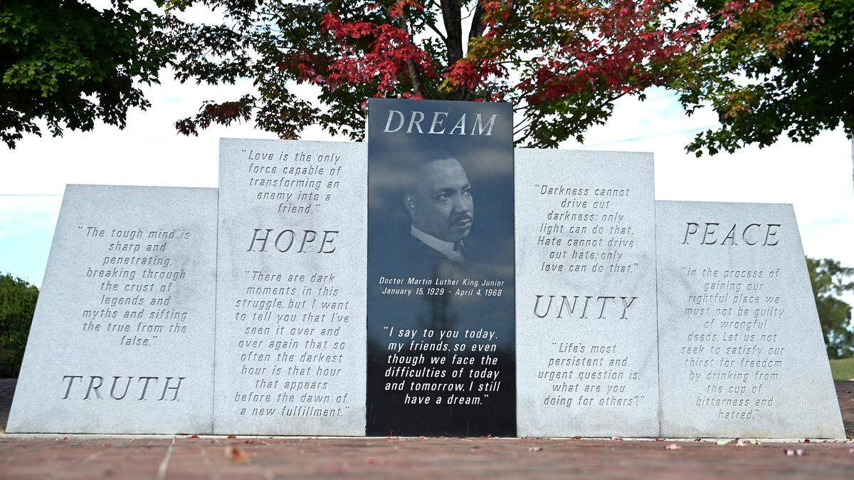 Graffiti is faintly visible on panels of the Dr. Martin Luther King Jr. monument on Cabarrus Avenue in Concord, on Monday, October 9, 2023. Over the weekend the monument was vandalized. The Concord Police Department is investigating and city crews worked to restore the monument.