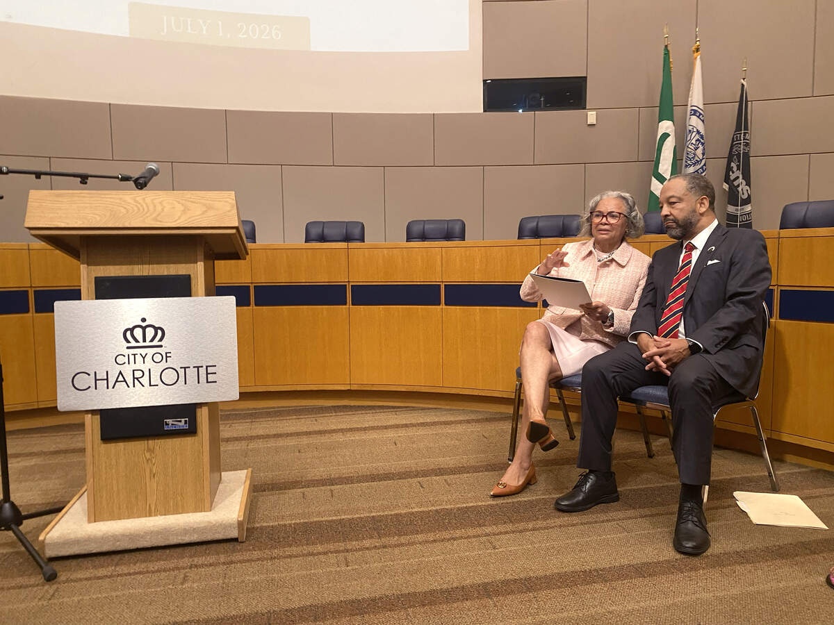 Charlotte Mayor Vi Lyles, left, speaks with trial attorney Robert Harrington, right, at the Charlotte-Mecklenburg County Government building on Wednesday, July 1, 2026. Harrington will be succeeding Lyles as the city’s mayor.