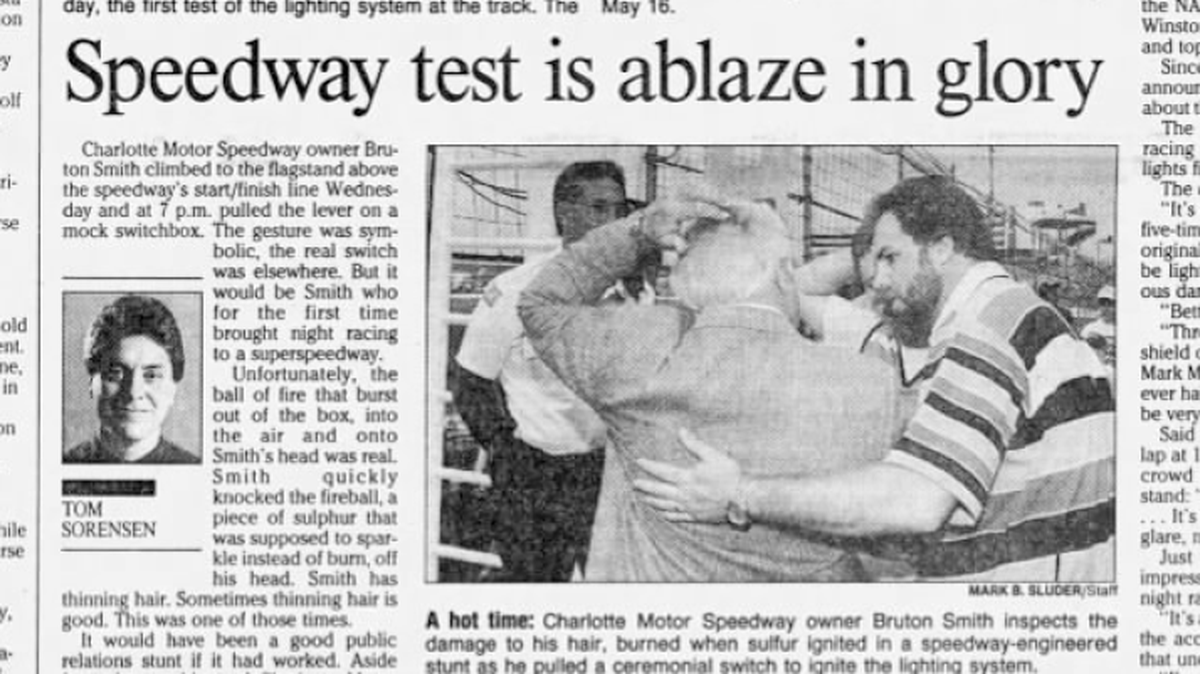 Clipping from the May 17, 1992, edition of The Charlotte Observer shows Bruton Smith reacting after his hair was set on fire.