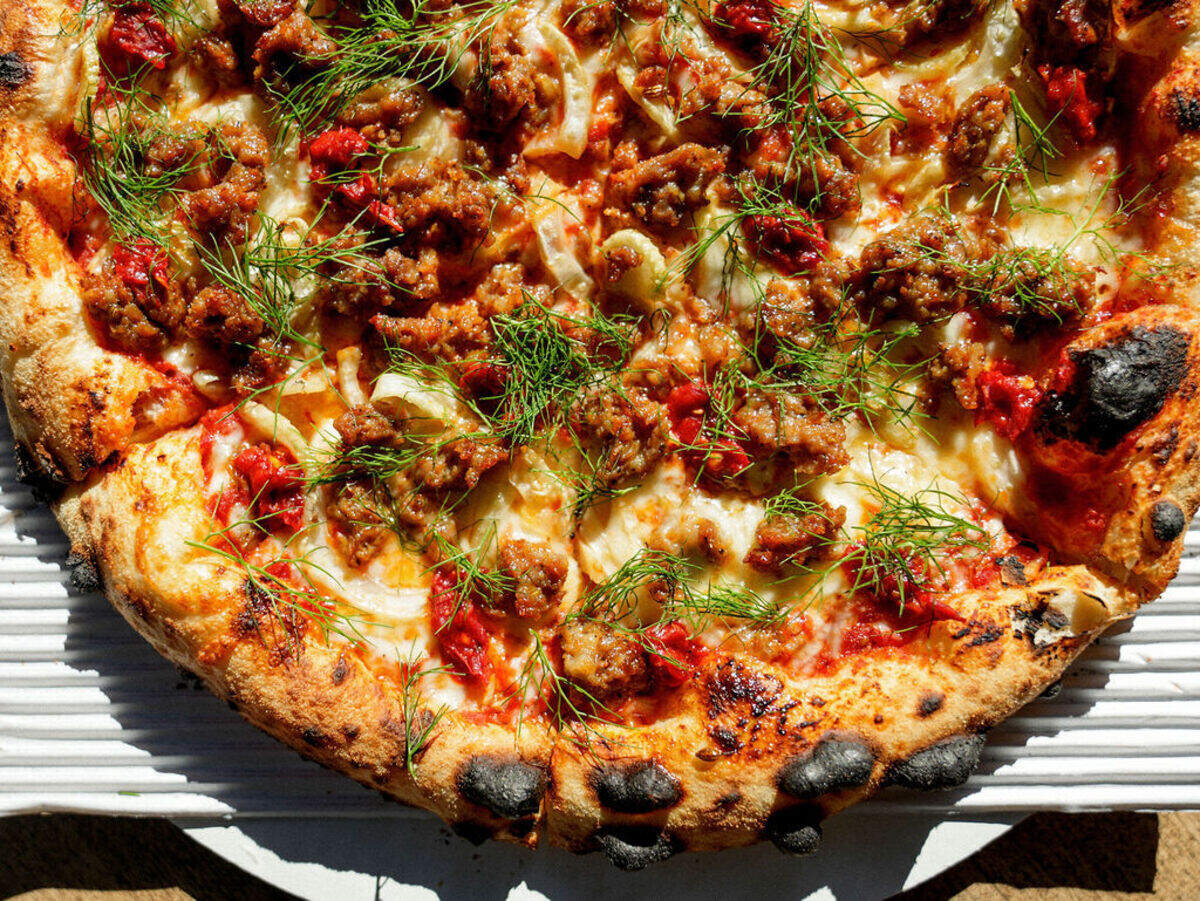 Da Bomb pizza with chili dollops and fennel. Gravity’s unique sourdough crust might be the best in Charlotte.
