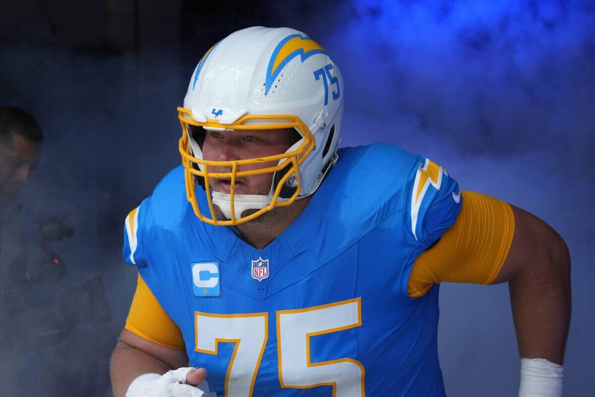 Sep 8, 2024; Inglewood, California, USA; Los Angeles Chargers center Bradley Bozeman (75) enters the field before the game against the Las Vegas Raiders at SoFi Stadium. Mandatory Credit: Kirby Lee-Imagn Images