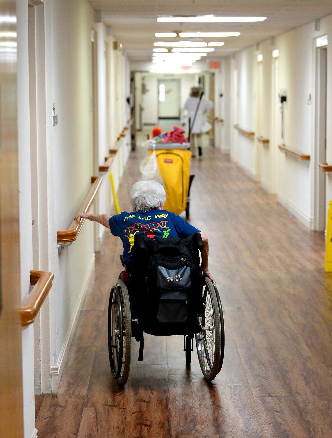 A resident at a Salisbury nursing home wheels down a hallway. “We’re in a crisis in terms of the staffing situation (inside nursing homes),” says Dave Richard, a deputy secretary for the N.C. Department of Human Services. “It is a crisis we need to address.”