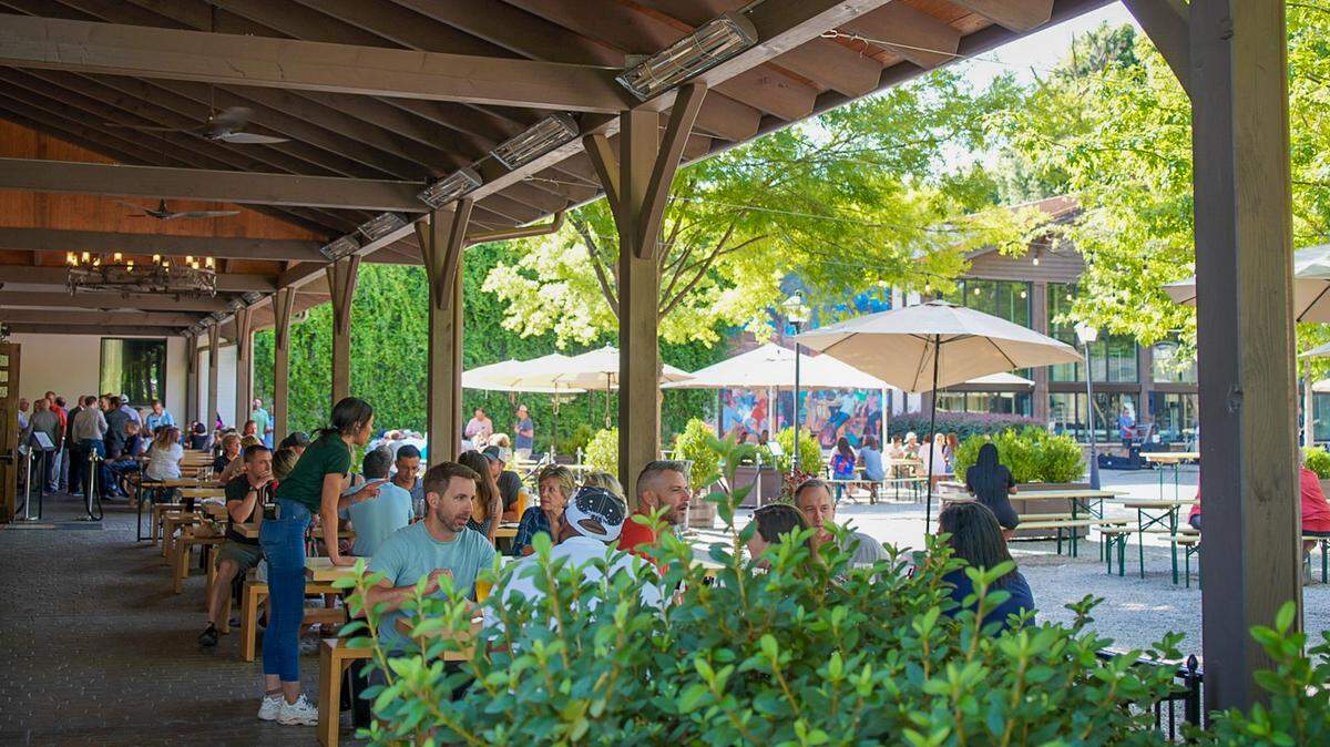 Enjoy a pint of beer at The Olde Mecklenburg Brewery’s expansive outdoor space in Lower South End.