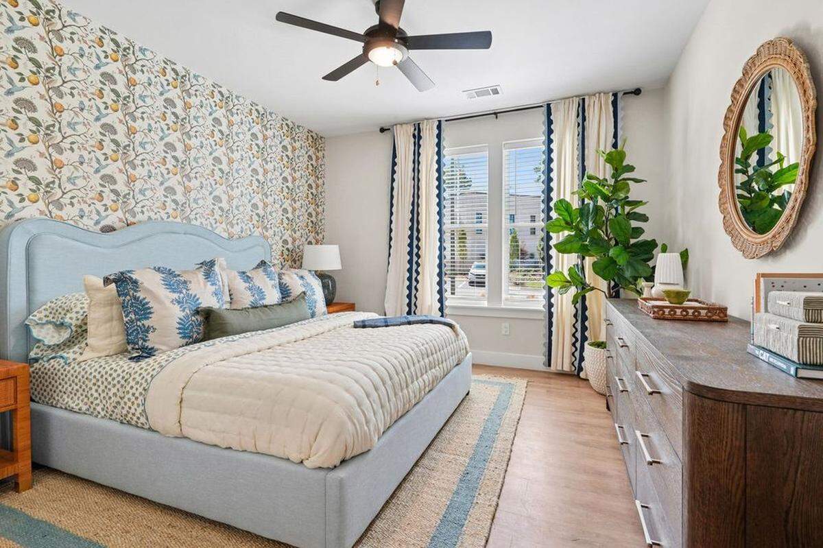 Shown is a bedroom of an apartment home at Novel Davidson.