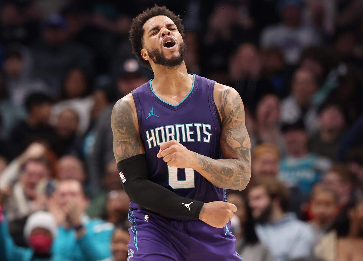 Charlotte Hornets forward Miles Bridges celebrates a dunk against the Dallas Mavericks during action at Spectrum Center in Charlotte, NC on Monday, January 20, 2025.