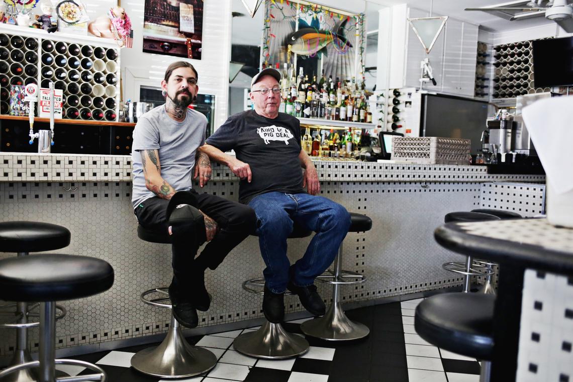 Chef Bill Smith and chef Justin Burdett at the bar at Crook’s Corner in Chapel Hill on Thursday, Oct. 4, 2018. Burdett will replace Smith when he steps down as the restaurant’s chef in January.