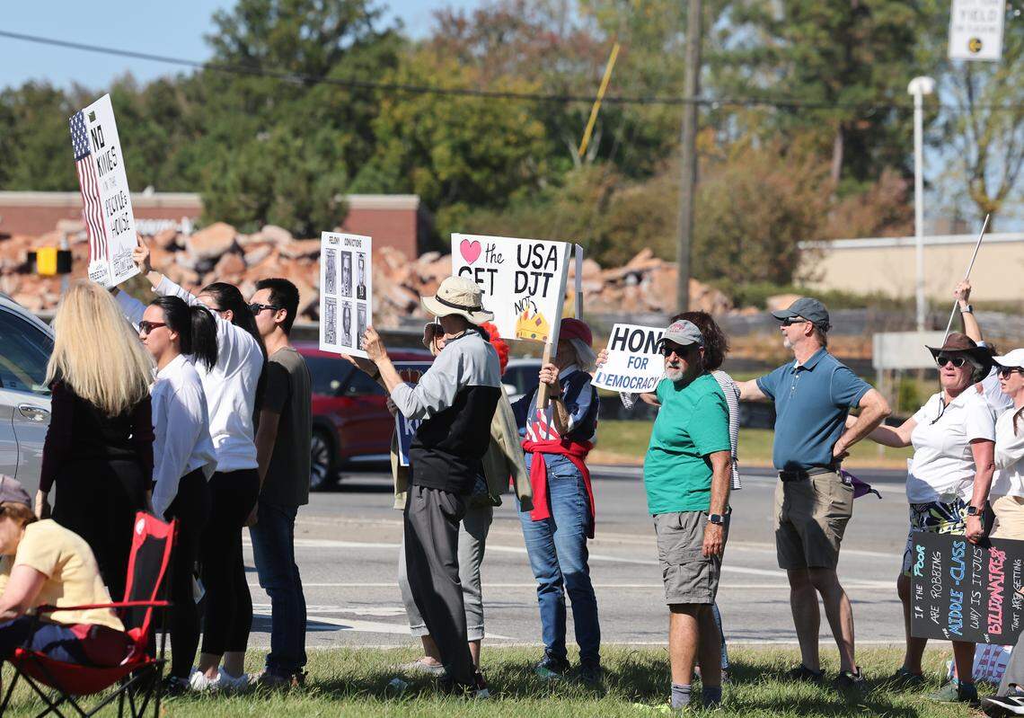 Hundreds of Indian Land and Fort Mill residents gathered across the street from Indian Lane Middle School on Saturday, Oct. 18, as part of the national ‘No Kings’ protests against President Donald Trump.