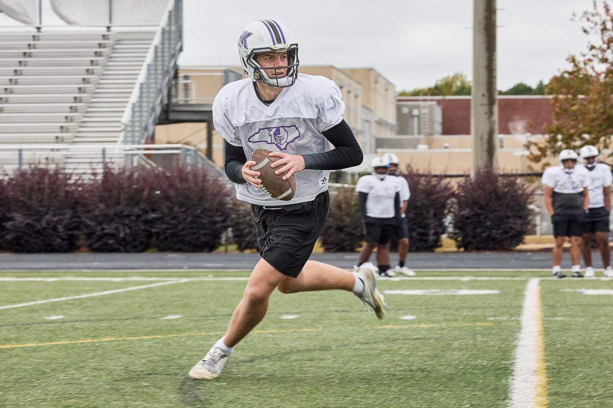 Ardrey Kell quarterback Jared Curtis looks for a receiver on a bootleg during practice on Oct. 30, 2025.