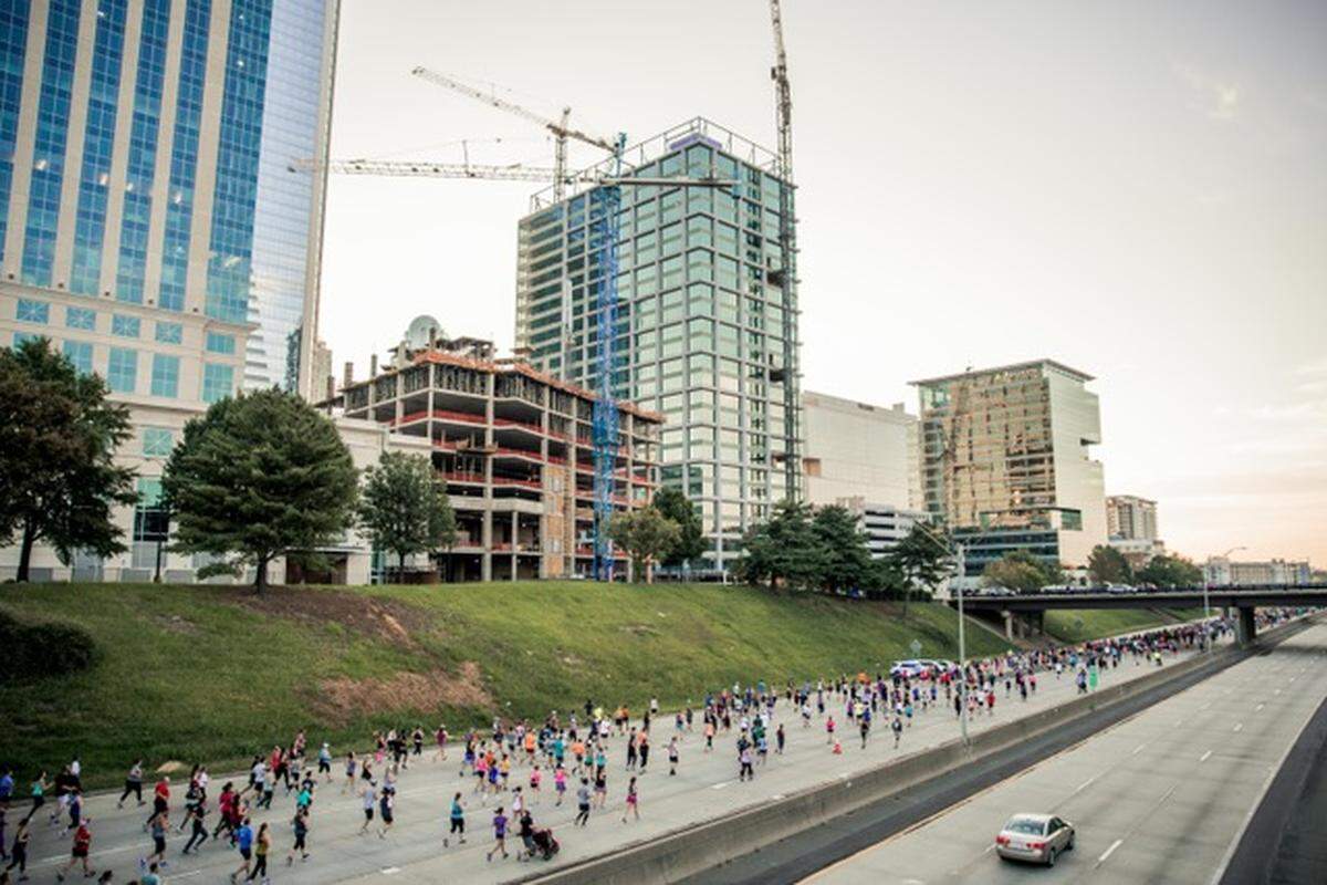 Watch Around the Crown 10K runners and walkers dart through Uptown Charlotte on Sunday, Sept. 4..
