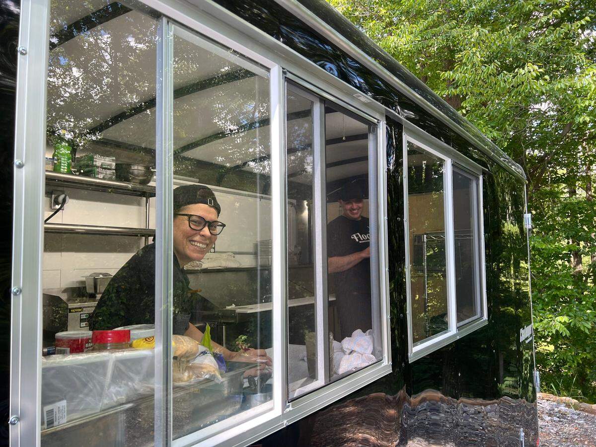 Flock. pastry chef Hayley Botticello, left, and Colin Sheehan, general manager of Flock in the food trailer at Davesté Kitchen by Flock.