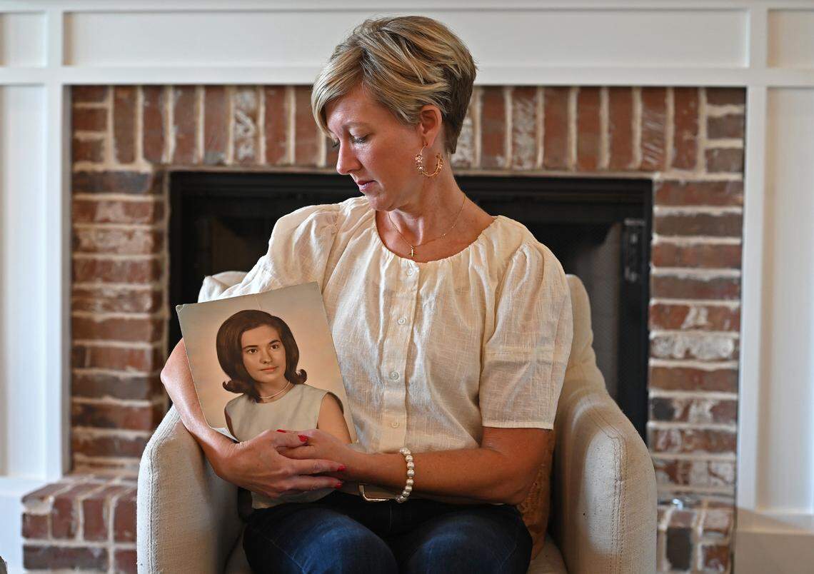 Bree Watson Johnson holds a photograph of her mother, Colette Watson. Colette Watson was a flight attendant on Eastern Airlines Flight 212 when the plane crashed on September 11, 1974. Following the plane crash, Watson continued flying for Eastern until the airline closed in 1991.