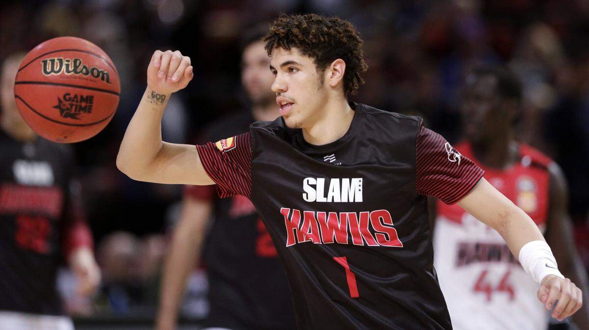 FILE - In this Nov. 17, 2019, file photo, LaMelo Ball of the Illawarra Hawks warms up before their game against the Sydney Kings in the Australian Basketball League in Sydney. LaMelo Ball’s bid to be a club owner in Australia hasn’t worked out. The American is expected to be a top pick in the upcoming NBA draft later this year.(AP Photo/Rick Rycroft, File)