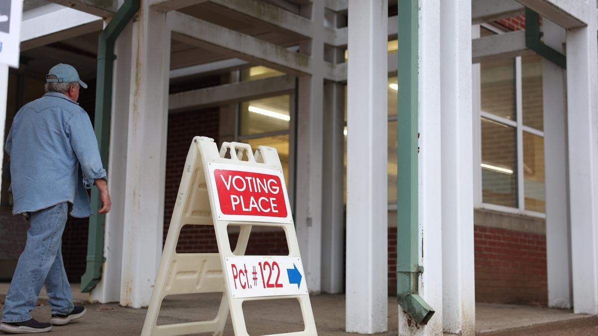 A voter enters precinct 122 at Lake Wylie Elementary School to cast their ballot during the primary election in Charlotte on Tuesday, March 3, 2026.