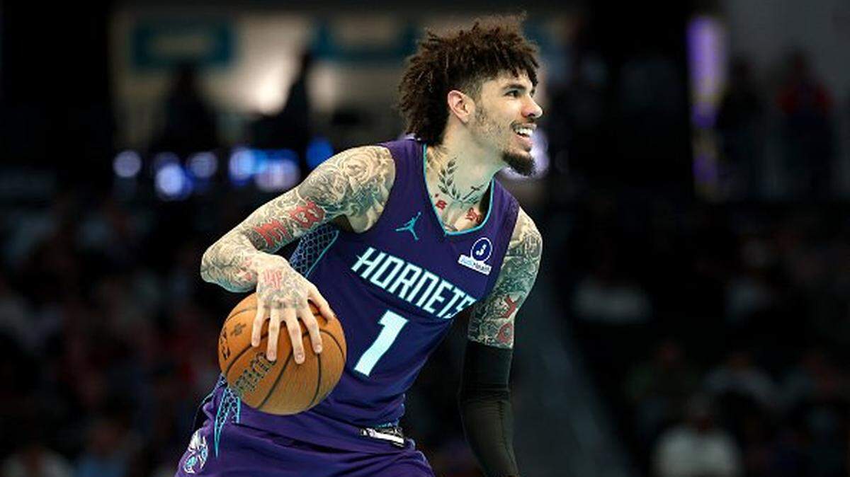 LaMelo Ball of the Charlotte Hornets dribbles during the second half of the game.