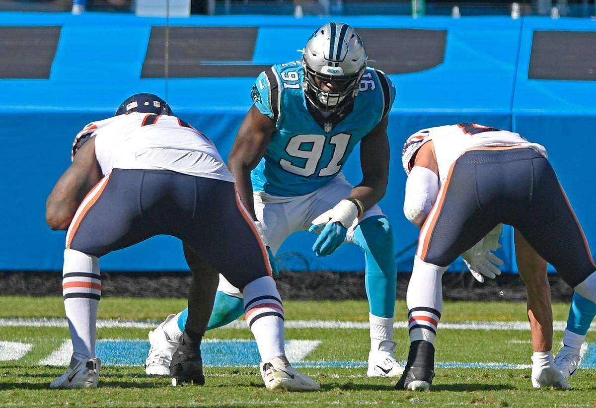 Carolina Panthers defensive end Stephen Weatherly (91) prepares to run a play against the Chicago Bears at Bank of America Stadium on Sunday, October 18, 2020. The Bears won, 23-16.