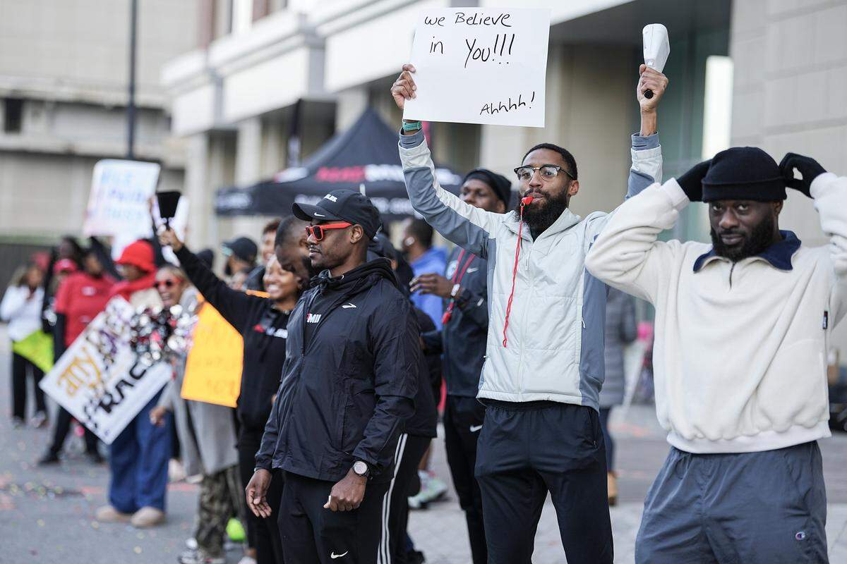Supporters cheer on participants in the Novant Health Charlotte Marathon Saturday, Nov. 15, 2025, in Charlotte, N.C.