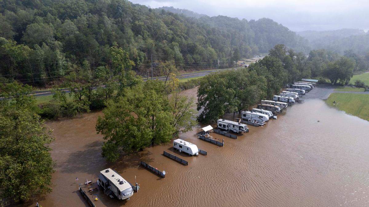 Water from the Tuckasegee River floods the River and Rails RV Park in Whittier on Friday, Sept. 27, 2024 as the remnants of Hurricane Helene moves through North Carolina.