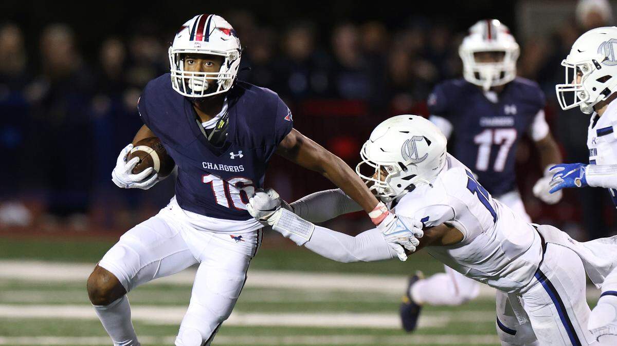 Providence Day wide receiver Gordon Sellars (left).