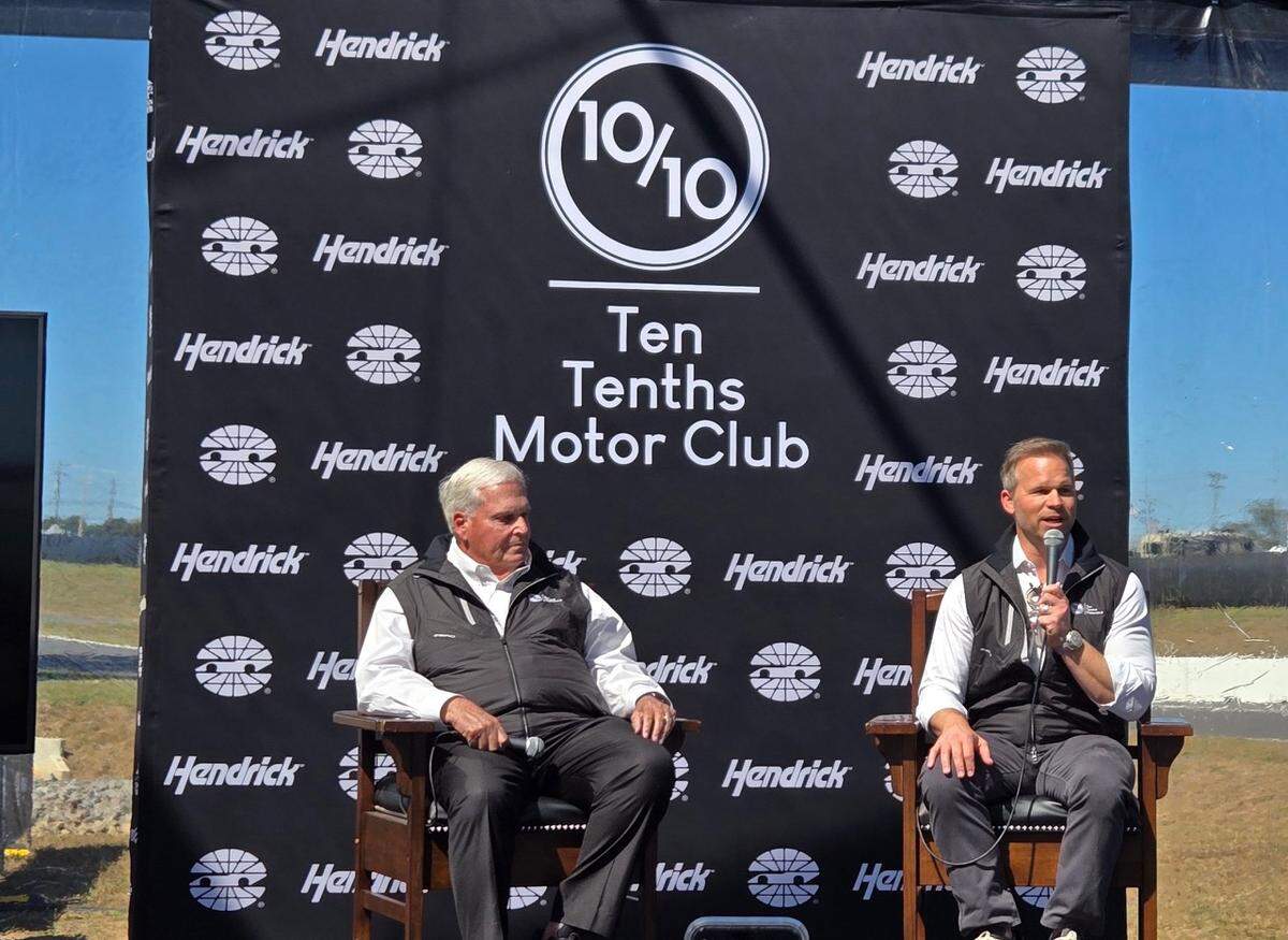 Rick Hendrick, left, of Hendrick Automotive, and Speedway Motorsports CEO Marcus Smith, unveil plans Thursday for their new automobile development complex.
