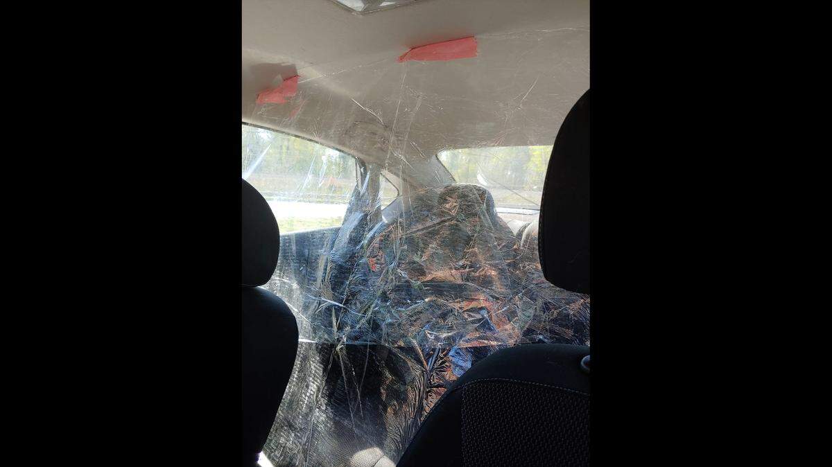 Uber driver Hank McGovern added this plastic shield in his car to help block spread of the coronavirus. in case any of his riders have the potentially fatal COVID-19 disease caused by the virus.