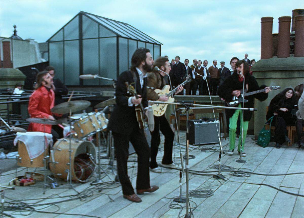 The Beatles in “The Beatles: Get Back.” Ringo Starr is playing his Ludwig Hollywood Maple drum kit here.