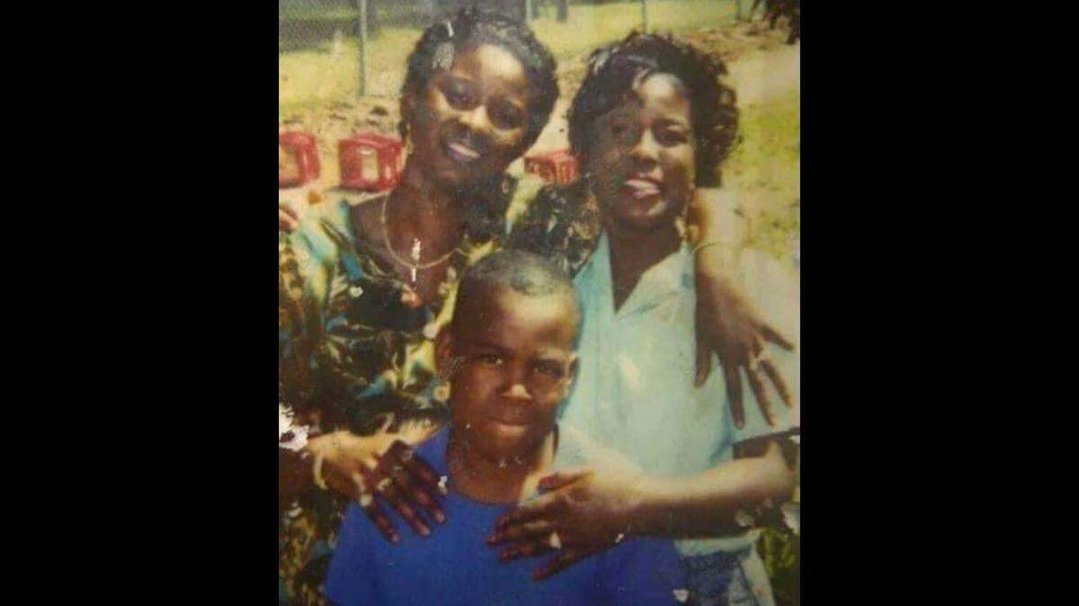 Lillian Nance, right, with her then-7-year-old son, Markeveus, and her older sister Carolyn Nance in an undated photo.