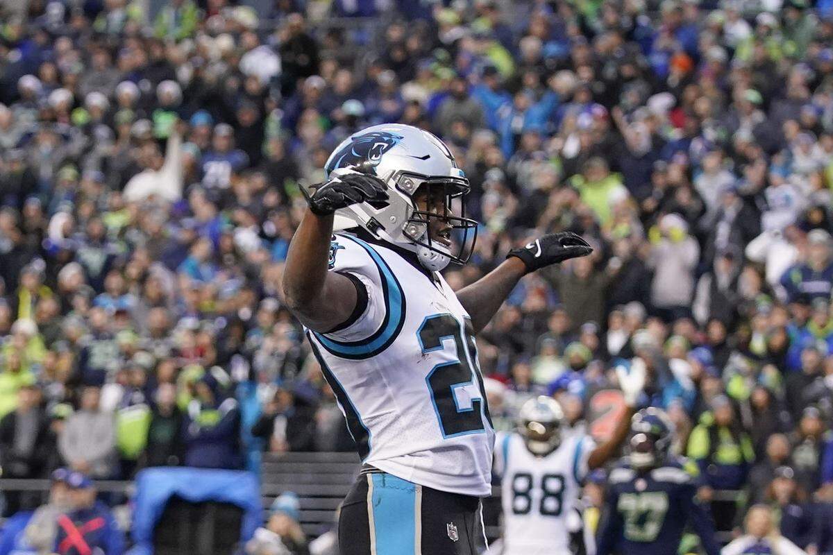 Carolina Panthers running back Raheem Blackshear (20) celebrates his touchdown against the Seattle Seahawks during the second half of an NFL football game, Sunday, Dec. 11, 2022, in Seattle. (AP Photo/Gregory Bull)