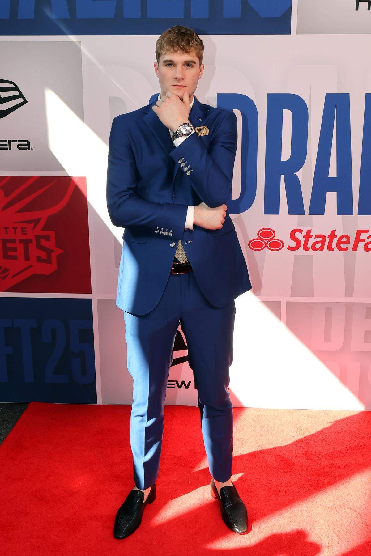  Liam McNeeley arrives before the first round of the 2025 NBA Draft at Barclays Center.