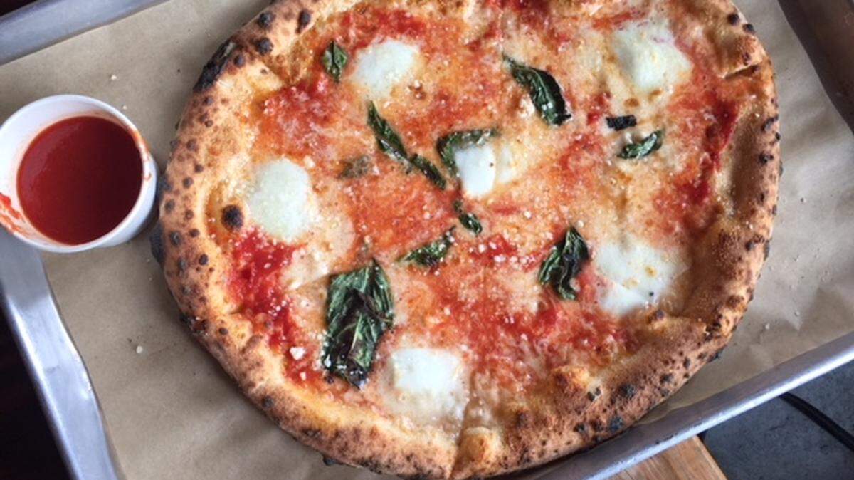 We tried traditional Neapolitan margherita pizzas all around Charlotte and settled on four as the best. Guess which one was our pick for the best?
