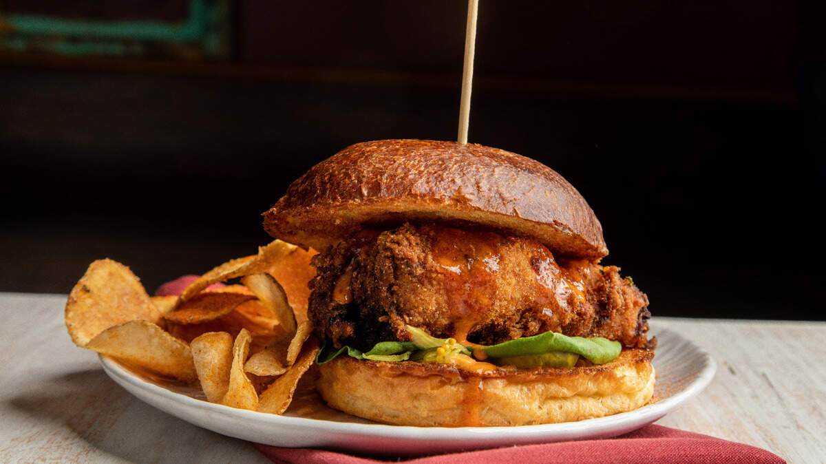 Bird is the Word will be a new counter-service restaurant highlighting chicken dishes, run by chef Greg Collier. It will feature the Leah & Louise chicken sandwich, shown here.