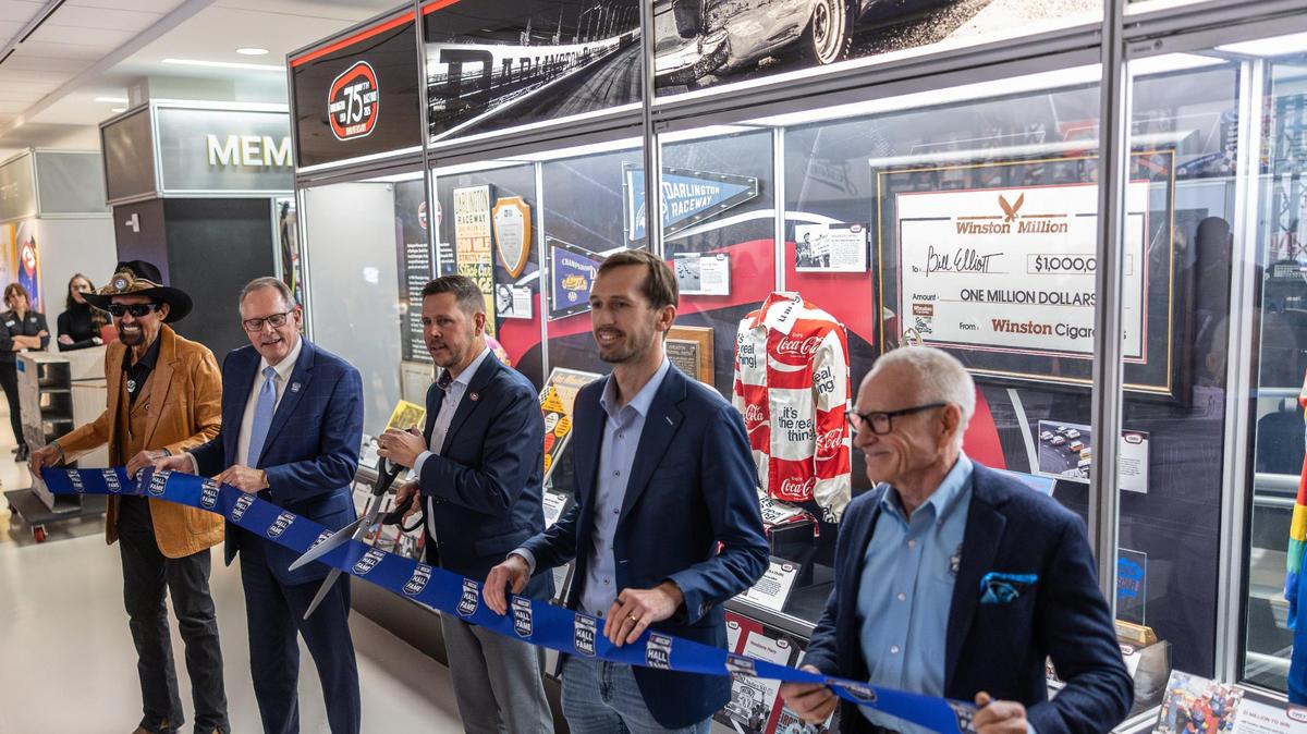 The ribbon cutting for the Darlington Raceway 75th Anniversary Exhibit at the NASCAR Hall of Fame Charlotte, N.C., on Tuesday, March 18, 2025.
