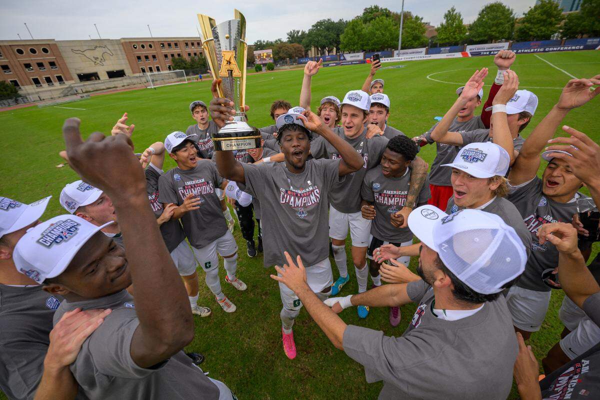 Charlotte men’s soccer celebrates its American Athletic Conference tournament title in November 2023.