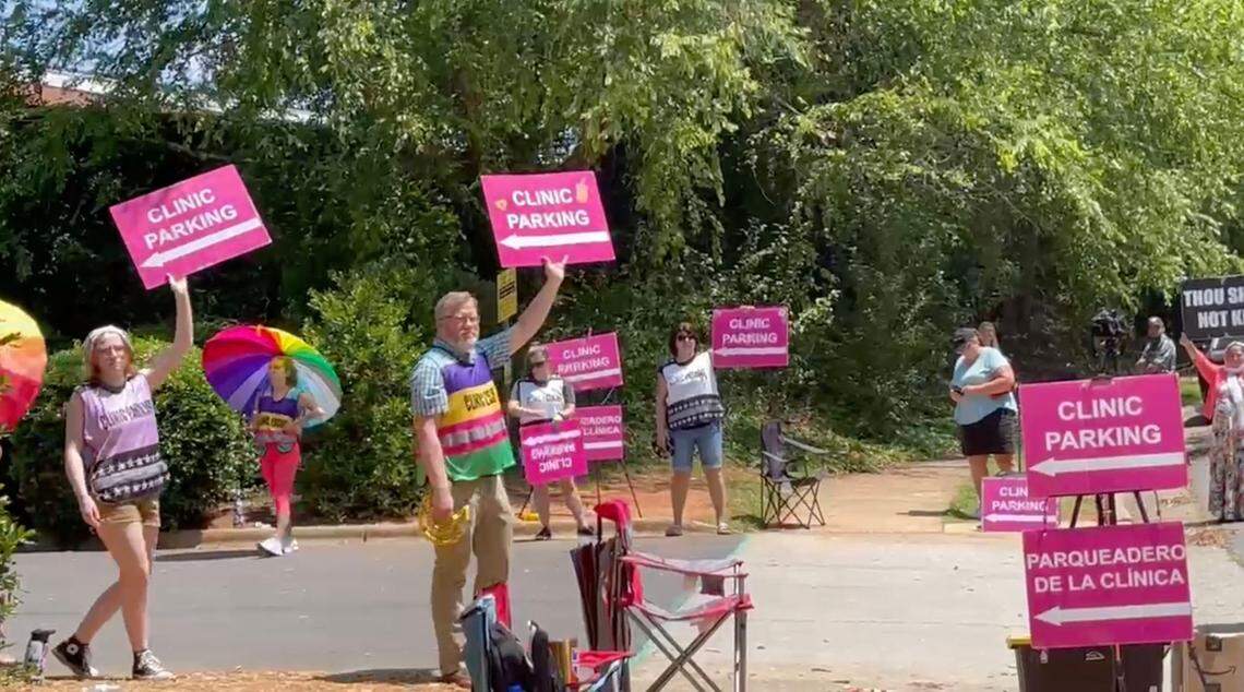 Protesters gather at A Preferred Women’s Health Center of Charlotte after Supreme Court overturned Roe vs Wade Friday morning.