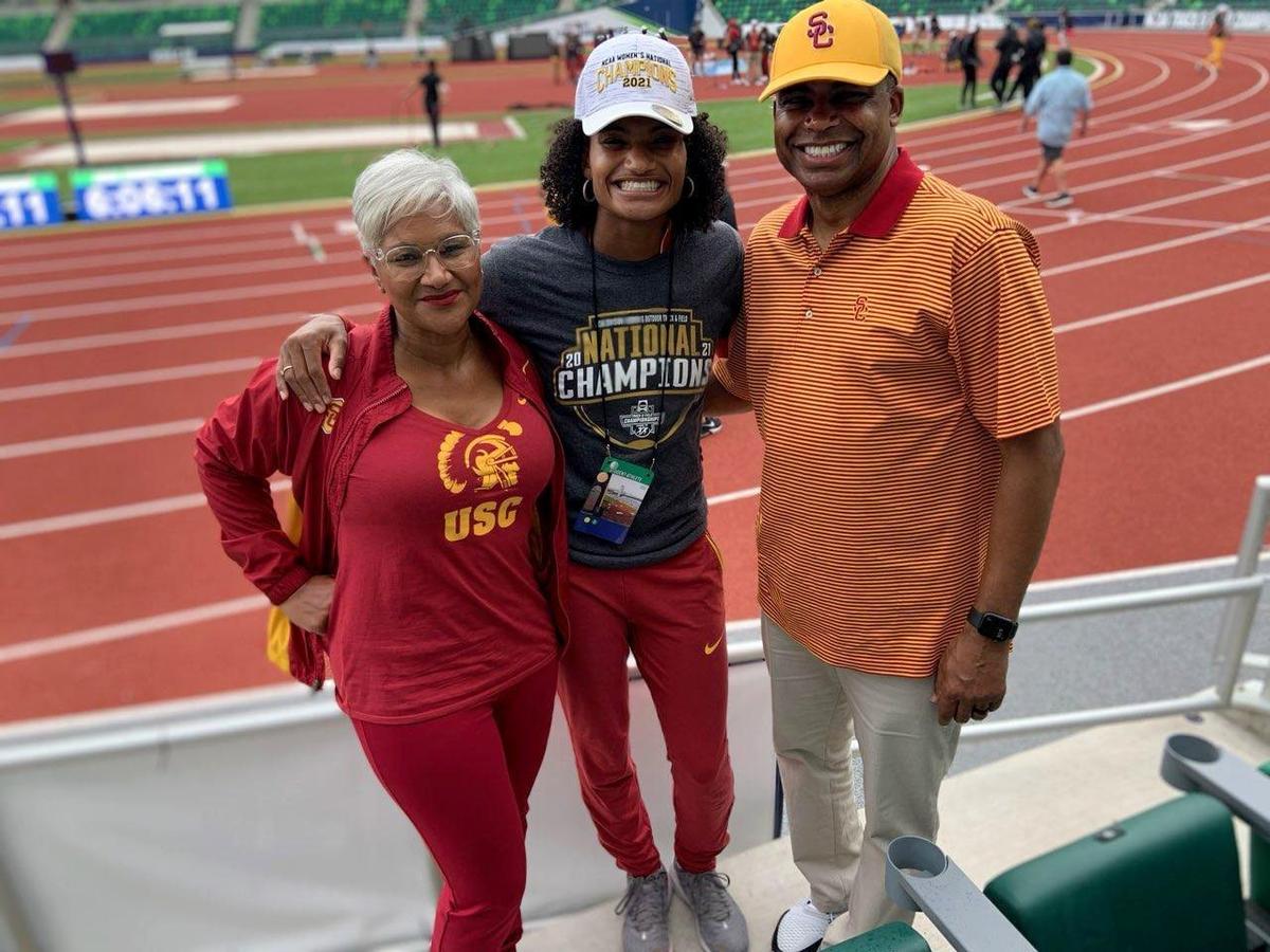 Kieth and Serena Cockrell with their daughter, Anna, at the NCAA Division 1 Track & Field Championship in Eugene, Oregon, in June. Anna won the 100-meter and 400-meter hurdles, becoming the second woman to accomplish such a feat.