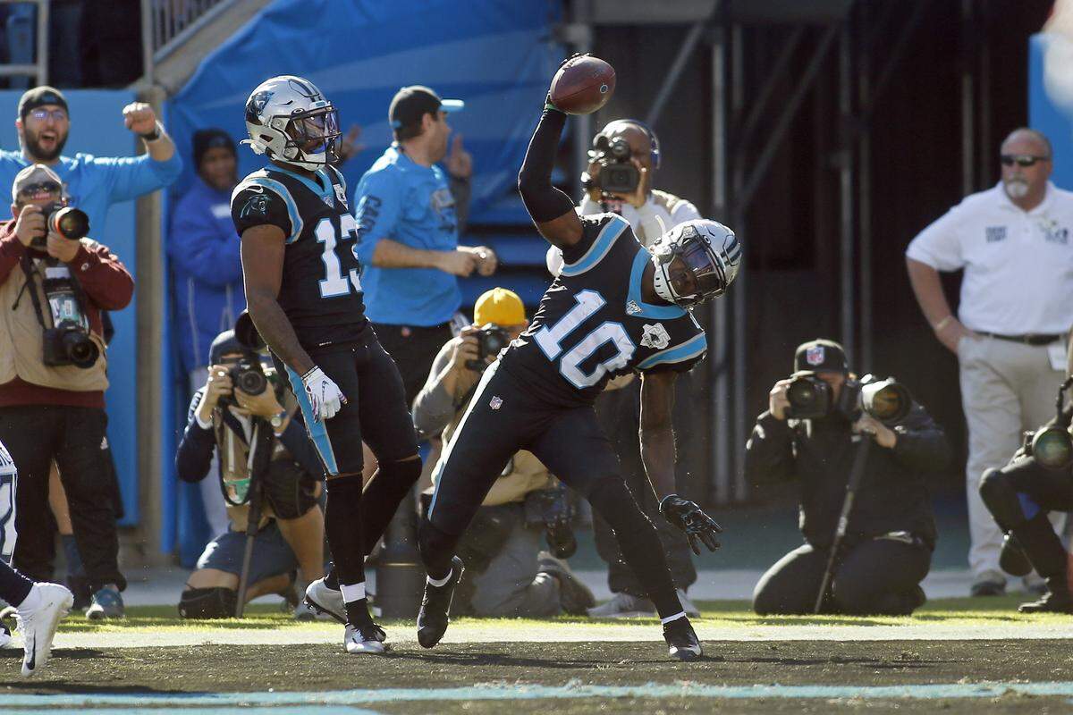 Carolina Panthers wide receiver Curtis Samuel (10) celebrates with wide receiver Jarius Wright (13) following Samuel’s 12-yard touchdown catch against Tennessee Sunday.