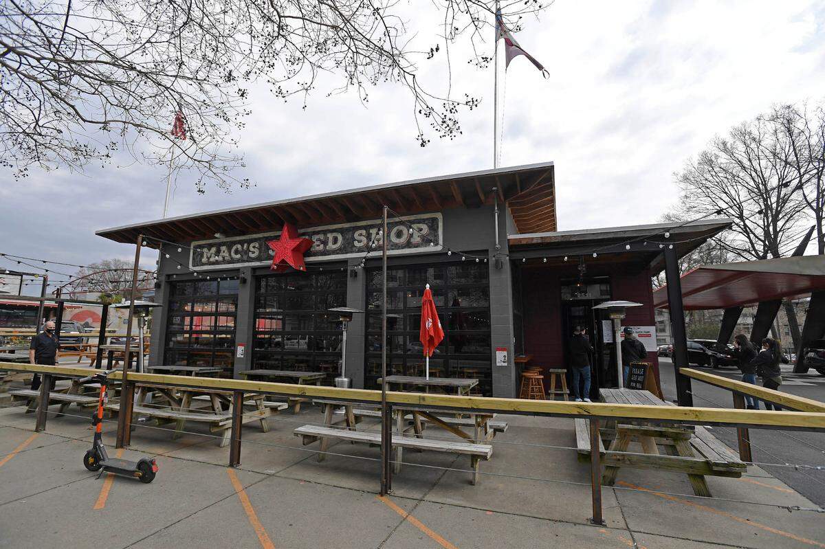 Customers enter MacÕs Speed Shop on South Boulevard  on Monday, March 15, 2021