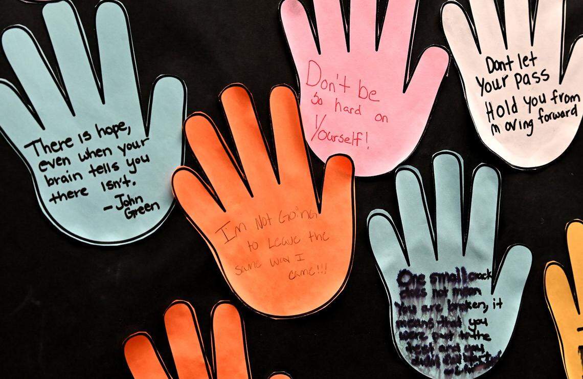 A resident’s sentiment “Im Not Going to Leave the same way I came!!!” was written on a hand cutout inside the library at the former Mecklenburg County Juvenile Detention Center in May 2022.