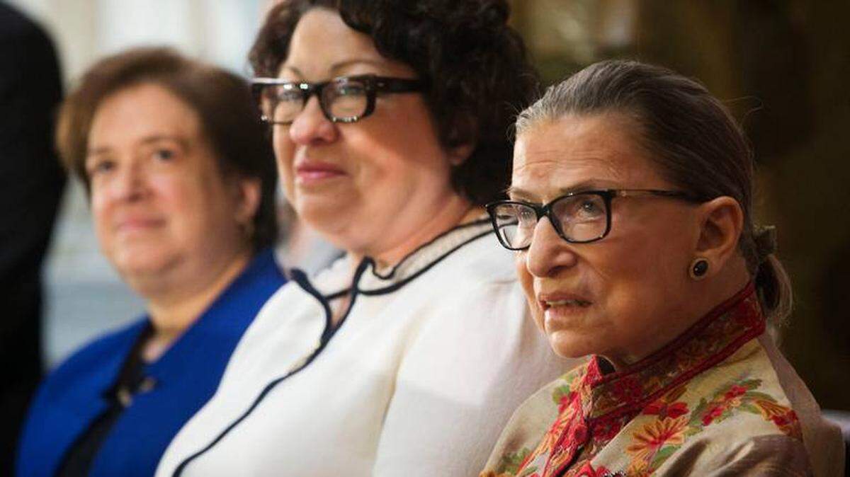 U.S. Supreme Court Justices Ruth Bader Ginsburg, Sonia Sotomayor and Elena Kagan on stage during a 2015 Women’s History Month reception on Capitol Hil in Washington. Ginsburg died Friday at age 87.
