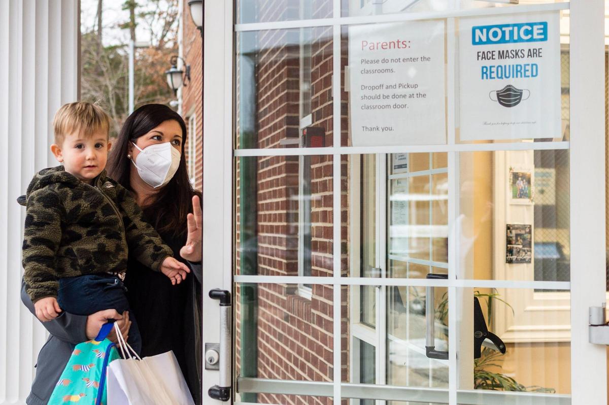 Erin DeWaters drops her 2-year-old son, Cole, off at daycare in Charlotte one morning last week.