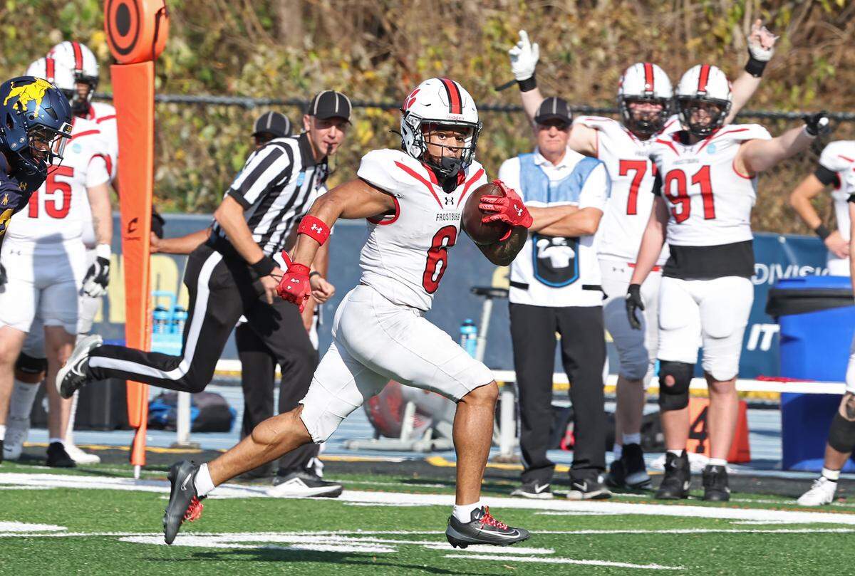 Frostburg State running back KJ Smothers glances over his right should as he escapes the Johnson C. Smith University Golden Bulls defense for a touchdown during action at the Irwin Belk Complex in Charlotte, NC on Saturday, November 22, 2025. 